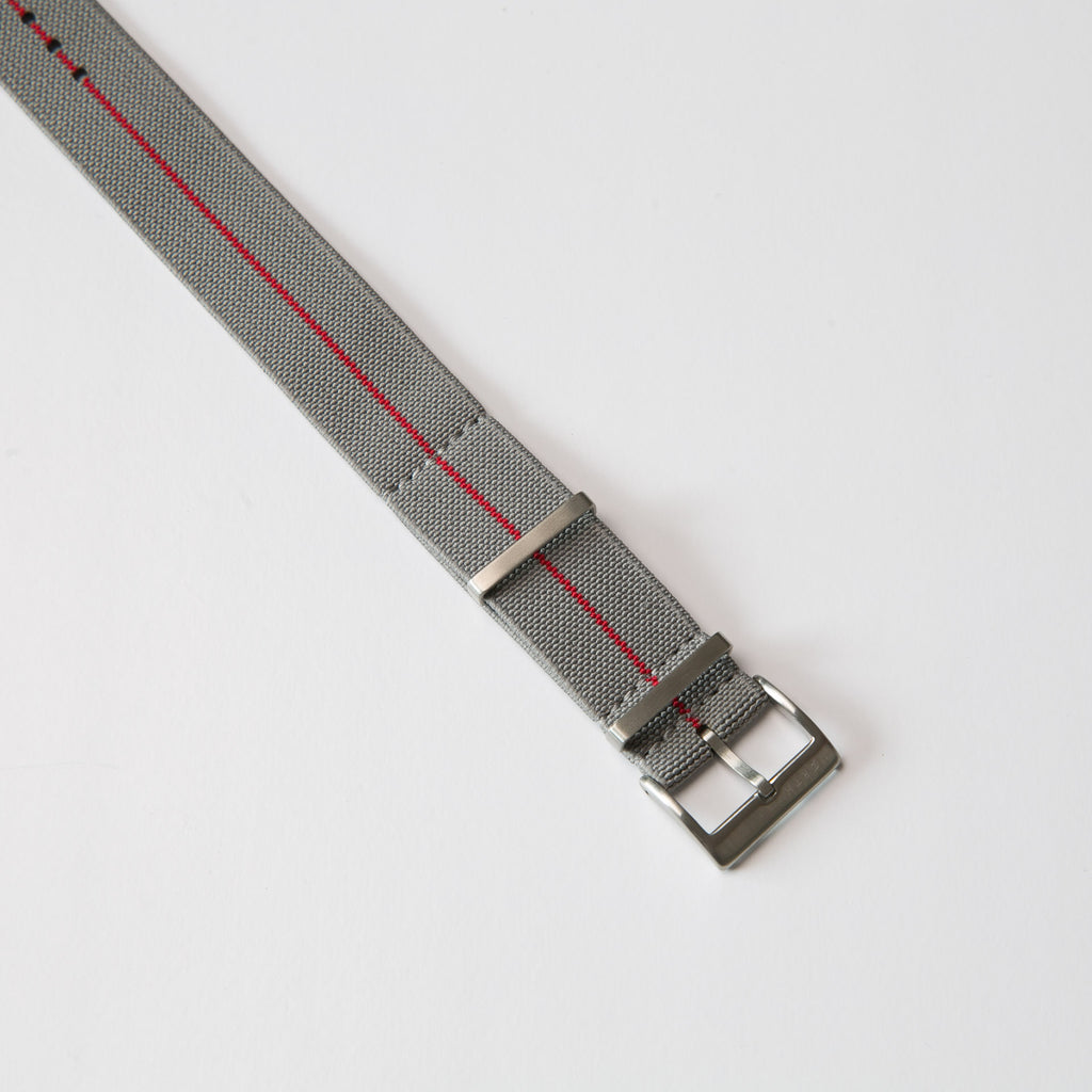 Grey with red stripe elastic single pass nato strap by North Straps